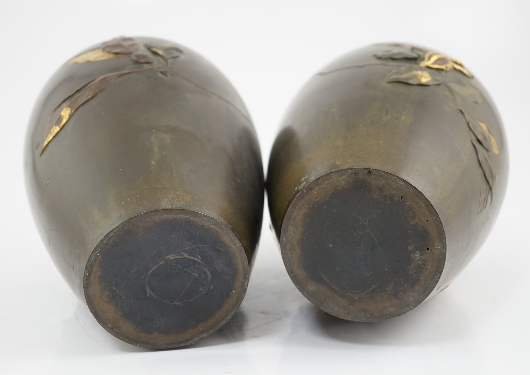 A pair of Japanese bronze and mixed metal ovoid vases, Meiji period